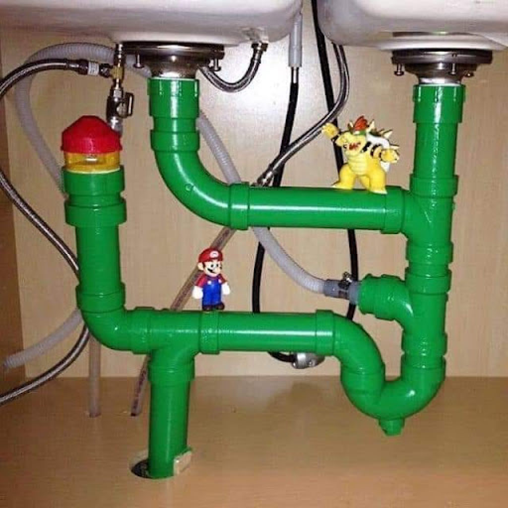 Trending real estate meme, Mario and Bowser playing under kitchen sink