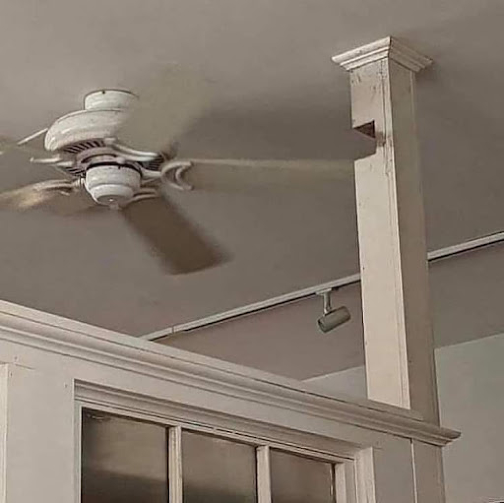 Support beam cut off to give space for ceiling fan blades to pass through